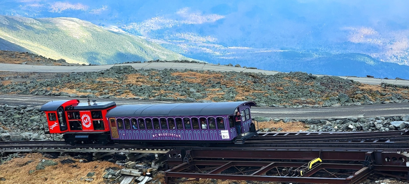 Take the Cog Railway to the top of Mount Washington. 