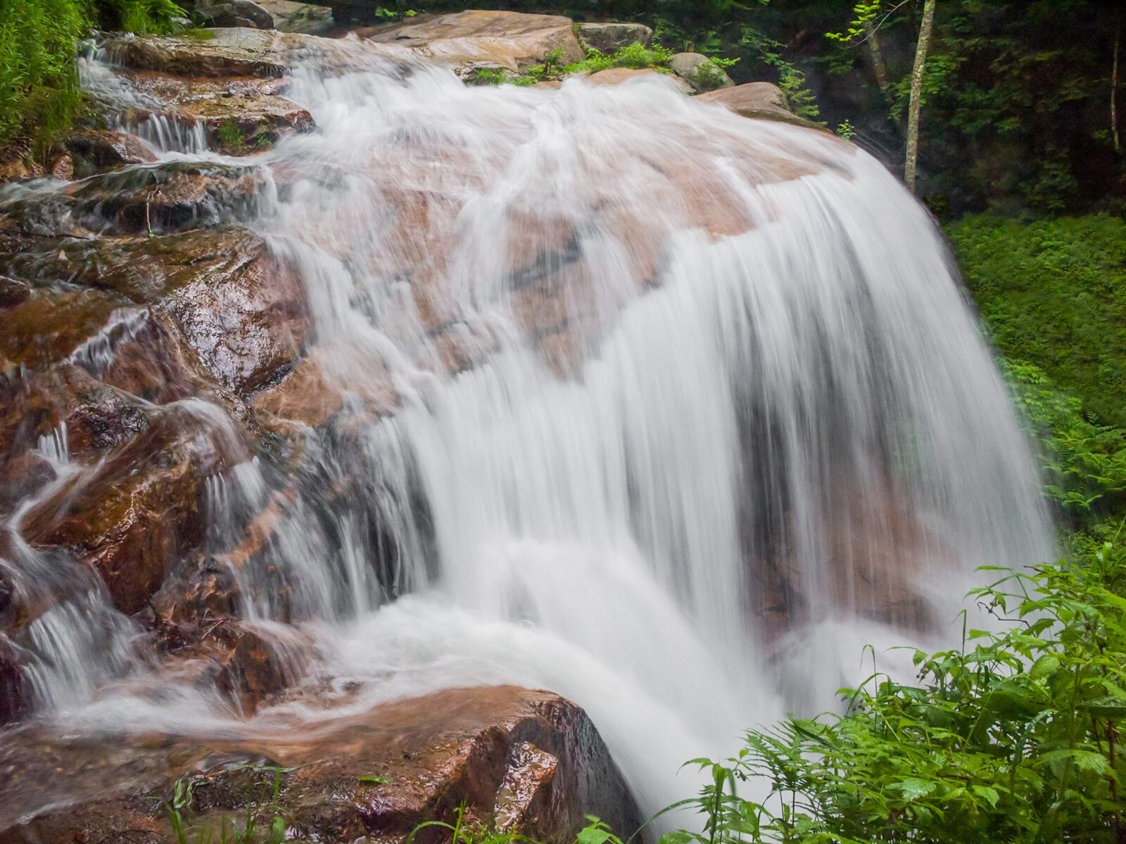 Avalanche Falls, make sure to visit when visiting Franconia Notch Bike Path in New Hampshire.