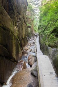 Riding through Franconia Notch State Park on the Franconia Notch Bike Trail