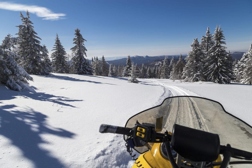 Find the Best White Mountains Snowmobiling Trails Near our luxury Bed and Breakast