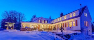 The snowy exterior of our Bed and Breakfast in New Hampshire - a great place for couples to enjoy a romantic getaway