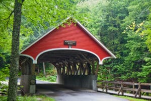 A beautiful covered bridge near Franconia Notch State Park, one of the best places to stay in New Hampshire