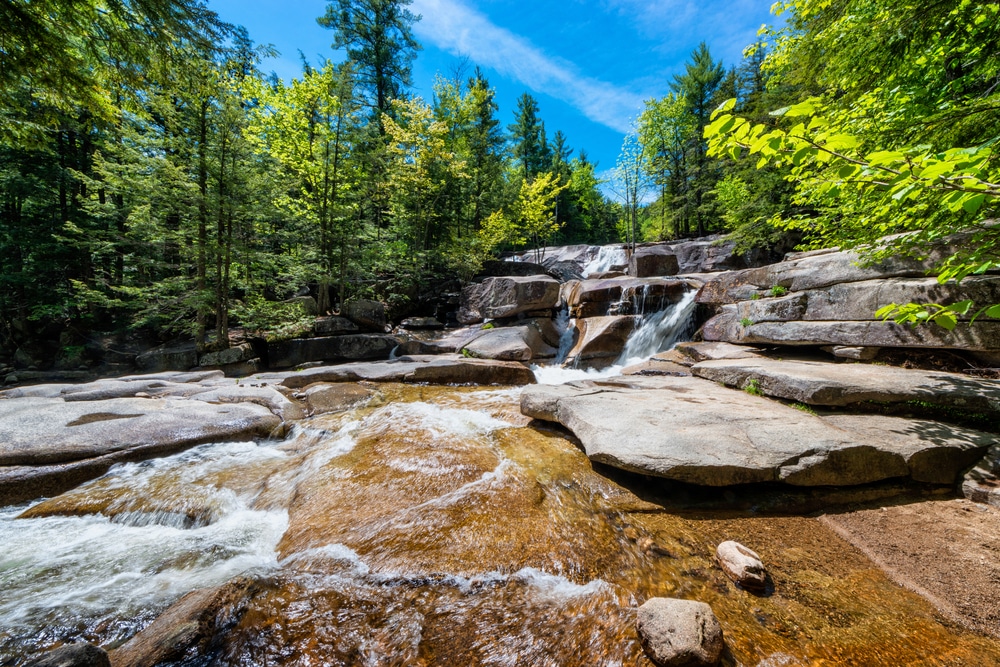 visiting waterfalls like Diana's Baths is one of the best things to do in the White Mountains