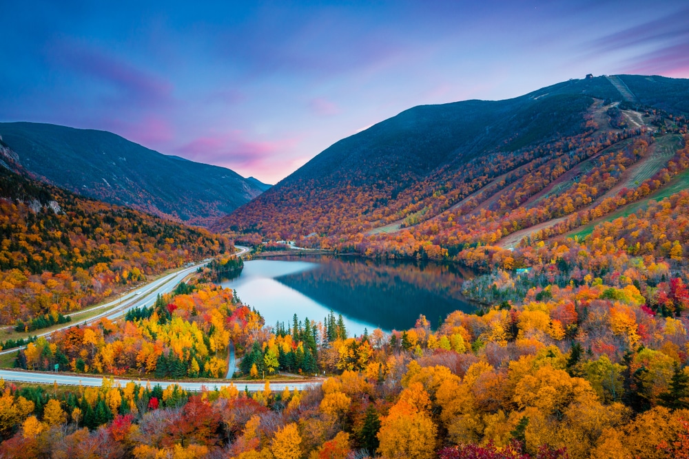 Hike the Artists Bluff Trail at Franconia Notch State Park to see some of the best New Hampshire Fall Foliage