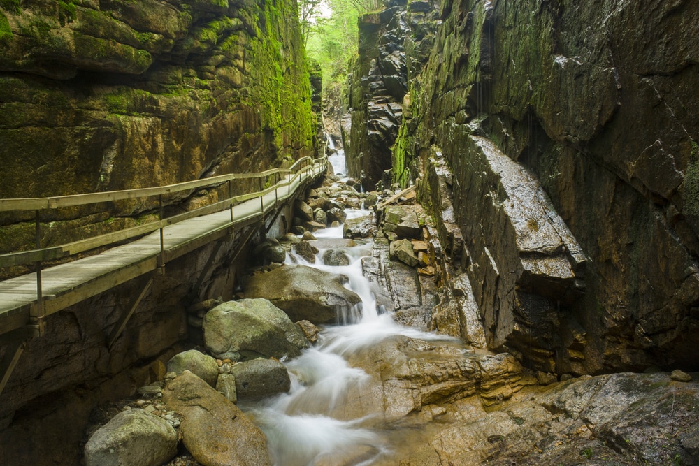 A long suspended bridge in the narrow Flume Gorge at Franconia Notch State Park