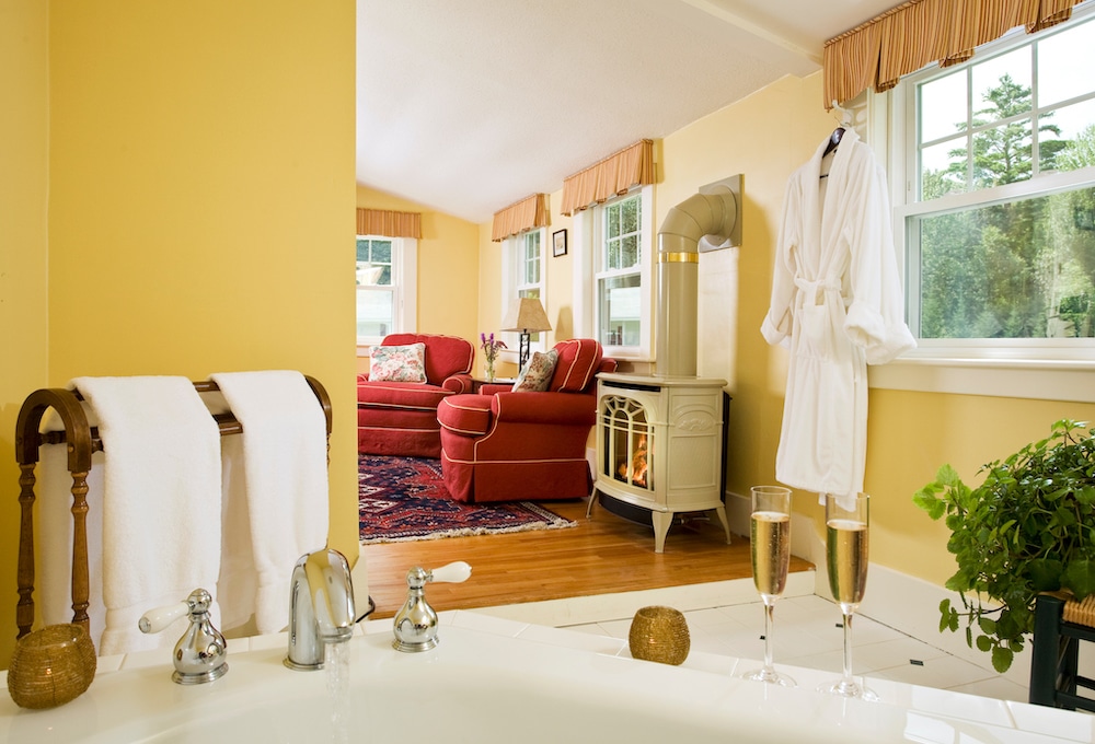 A bathtub view of the cozy Nickerson suite at one of the most romantic New Hampshire Inns